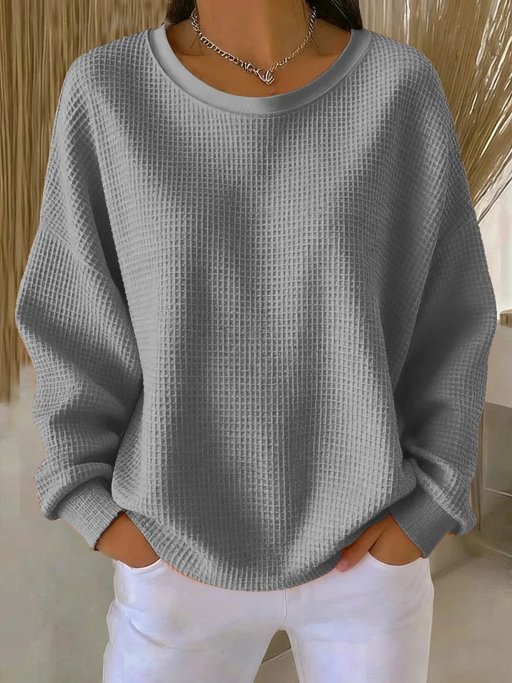 Jersey de mujer con cuello redondo, manga larga y textura marcada