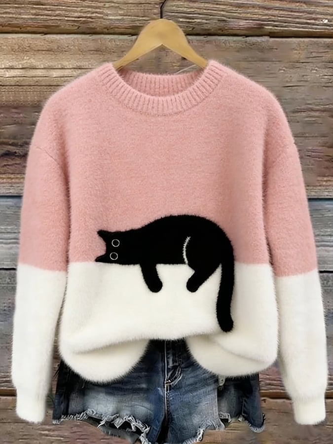 Damski sweter oversize z kontrastowym wzorem i czarnym motywem kota