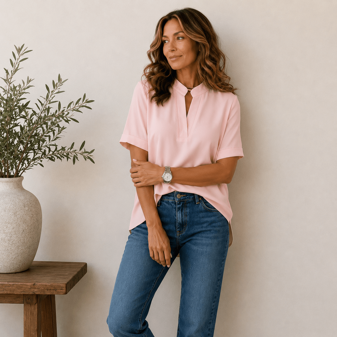 Női sima blúz V-nyakkivágással, rövid ujjal és bő szabással