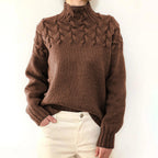 Pull femme à col roulé, torsades et manches longues