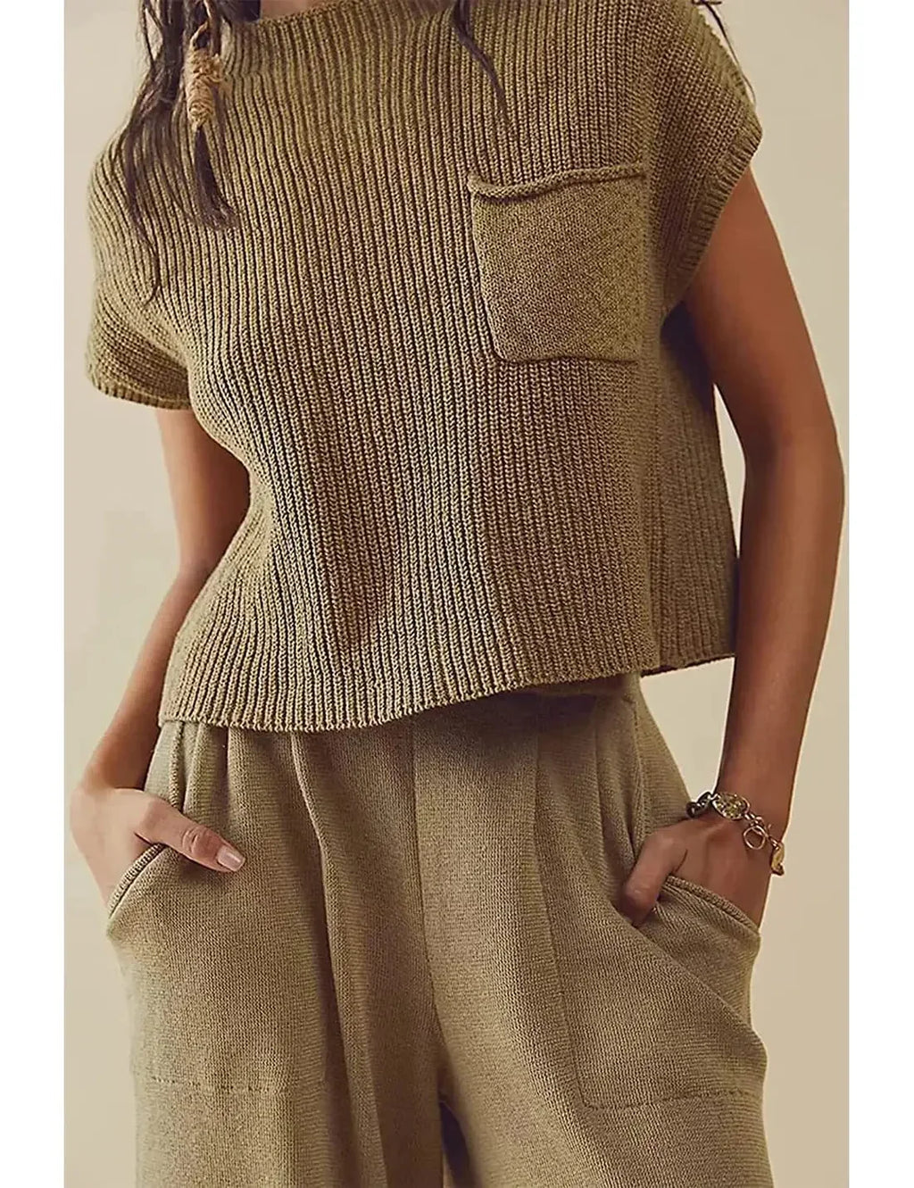 Maglione donna in maglia a coste con tasca