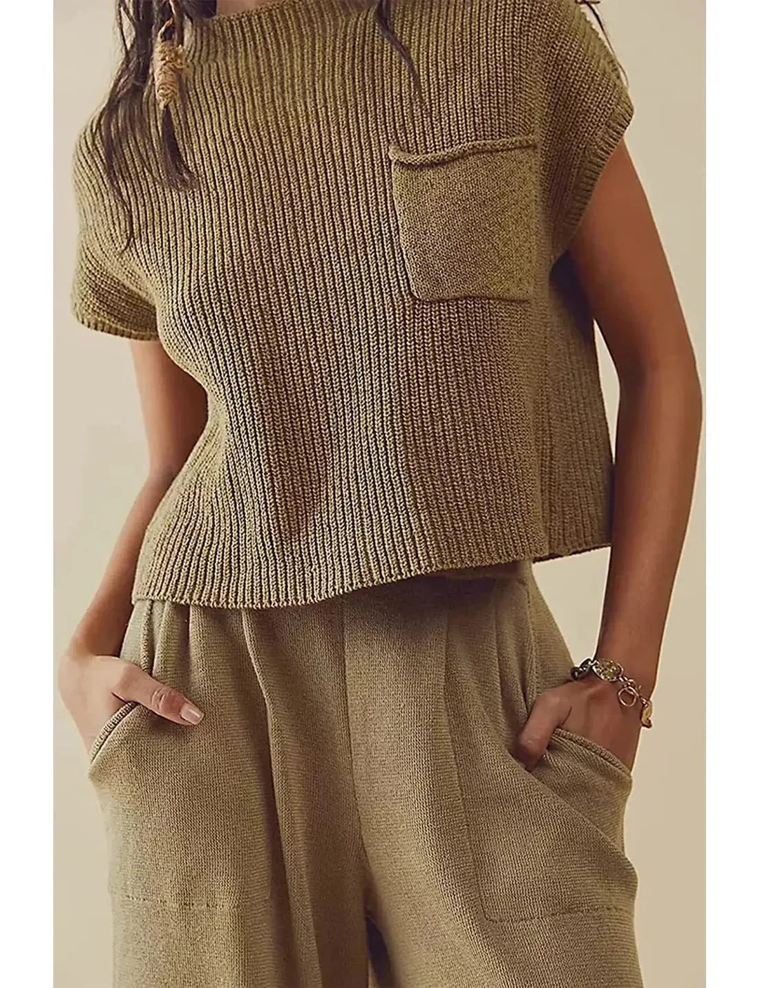 Maglione donna in maglia a coste con tasca