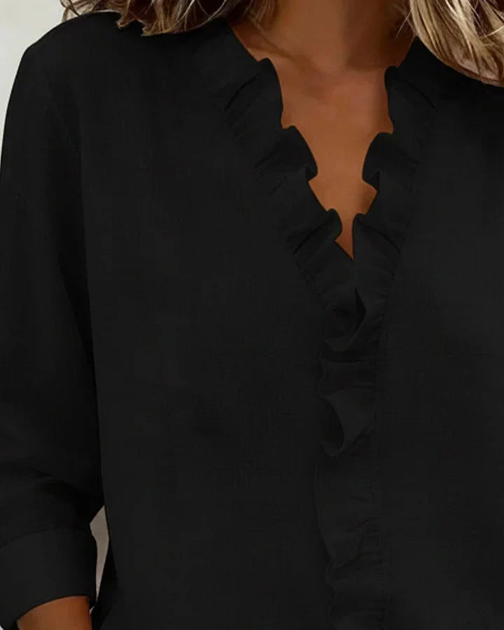 Blusa de mujer con volante en el escote en V y corte holgado