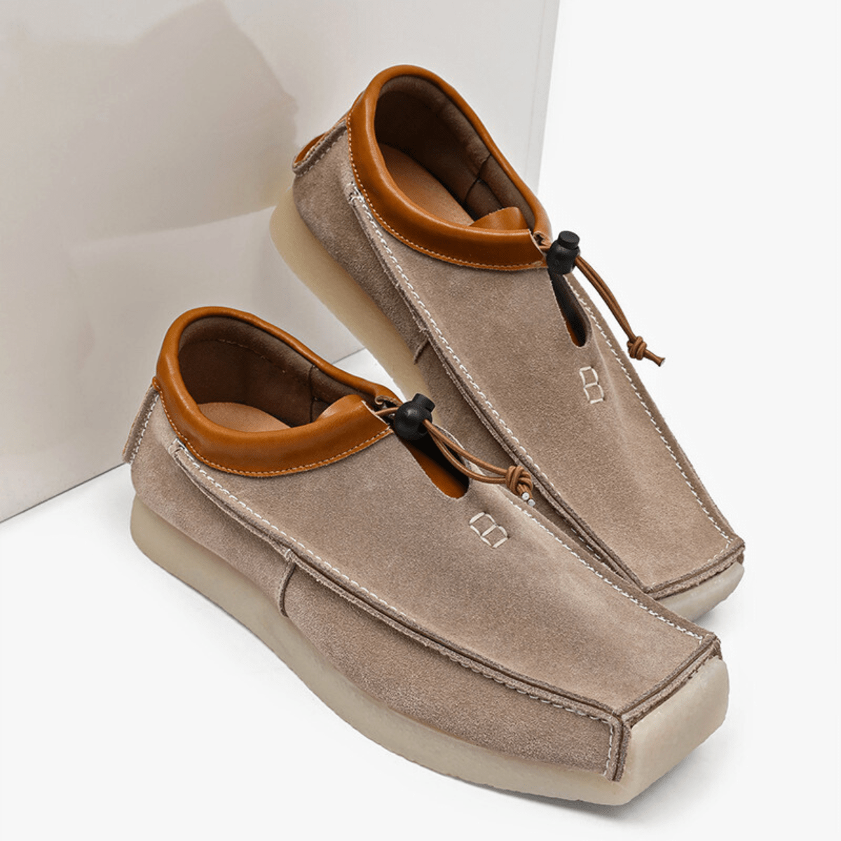 Mocassini slip-on con punta quadrata e cordoncino