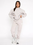 Completo sportivo donna con cappuccio e pantaloni jogger