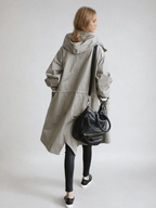 Gabardina oversize de mujer con capucha y botones