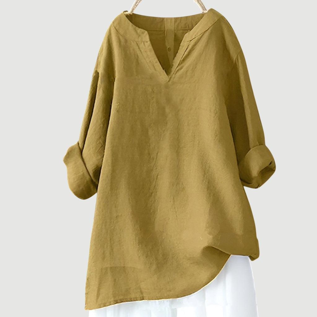 Túnica camiseira de mulher com decote em V, corte folgado