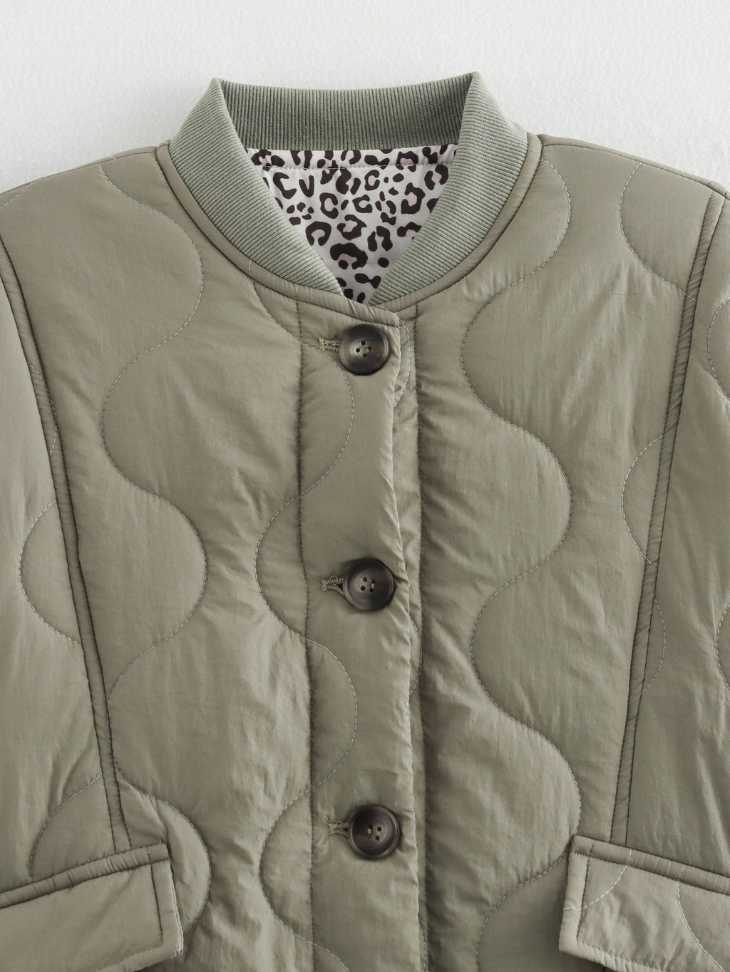 Veste matelassée femme à col montant et poches