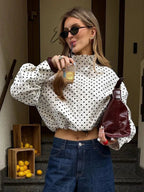 Veste femme à pois, courte, à col montant et zip