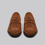 Penny loafers de homem com biqueira redonda e sola plana