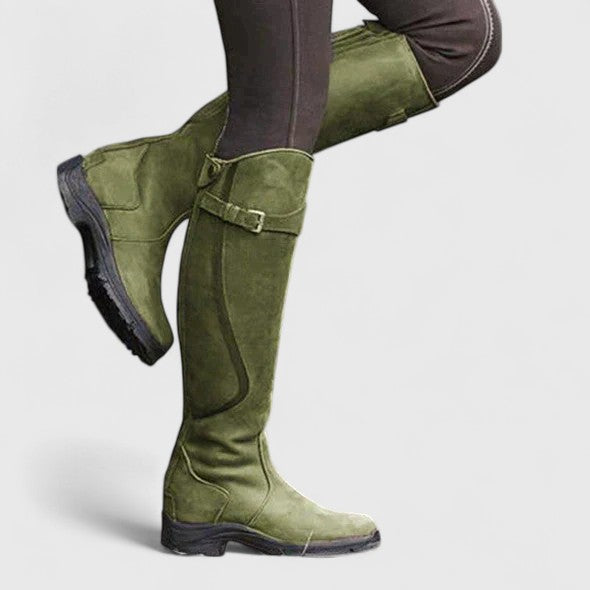 Botas de mulher até ao joelho com fivela e sola plana