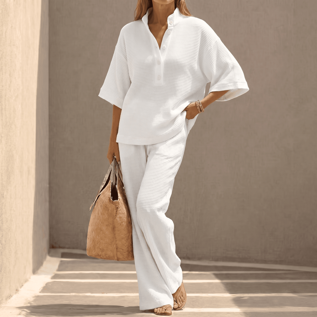 Completo donna in maglia con polo e pantaloni larghi