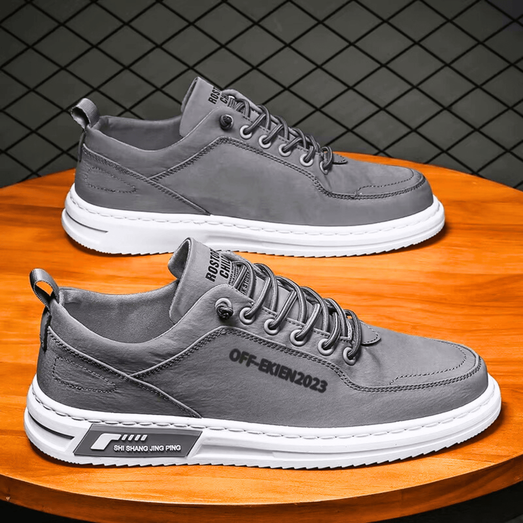 Niskie sneakersy męskie sznurowane z jasną podeszwą i ozdobnymi przeszyciami