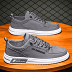 Niskie sneakersy męskie sznurowane z jasną podeszwą i ozdobnymi przeszyciami