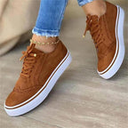 Sneakers donna con lacci, dettagli traforati e suola spessa